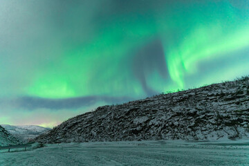 Fototapeta na wymiar aurora borealis beautiful northern lights in abisko sweden