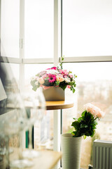 beautiful wedding bouquet with roses in bride's hands.