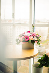 beautiful wedding bouquet with roses in bride's hands.