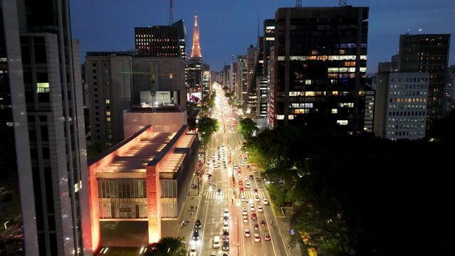 Sao Paulo Brazil. Night scape Masp Museum at Paulista Avenue at downtown Sao Paulo Brazil. Transportation scenery. Corporate business offices buildings. Cityscape Paulista Avenue at Sao Paulo Brazil.