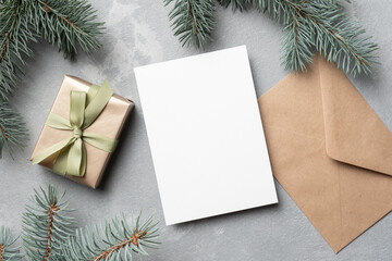 Fototapeta na wymiar Christmas mockup, blank greeting card with gift box and envelope