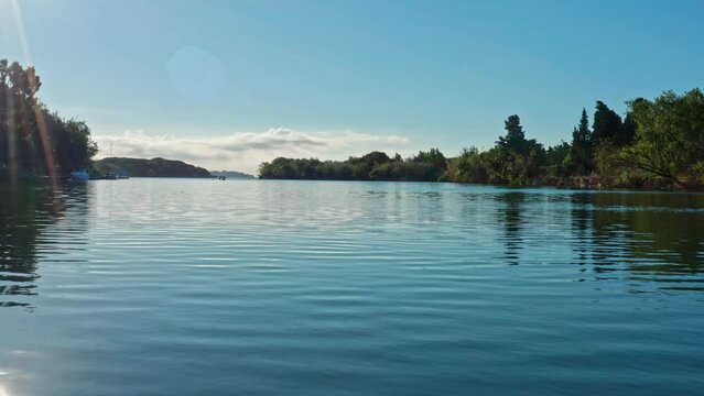 Aerial shot over Argens river sunny day discovering Saint Raphael bay 