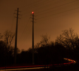 Powerline towers at night long exposure.