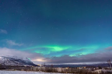 Keuken spatwand met foto aurora borealis winter landscape in Sweden northern lights © Dimitri