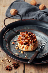 Variety of Cinnamon Rolls on Wooden Background