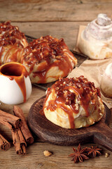 Variety of Cinnamon Rolls on Wooden Background