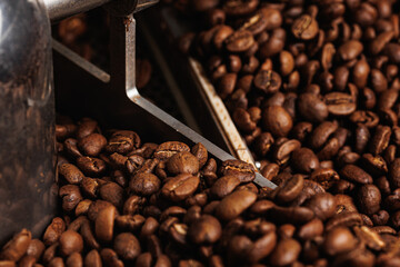 Roasting process coffee beans on professional mixing roaster machines