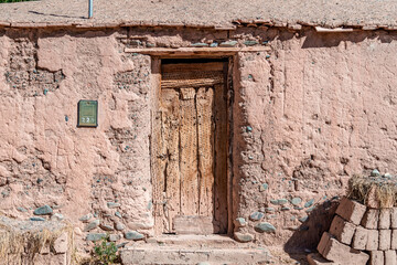 Fototapeta na wymiar a house made of clay and red bricks in the countryside of Aregenina in the Andes mountains
