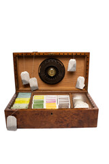 wooden box with humidor filled with tea of different flavors and colors and oak root tea bag wooden...