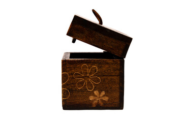 wooden box on white background and flower carvings on the sides of the open chest photo in horizontal with space for text