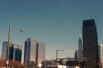 Fototapeta na wymiar Cityscape of Towers and Blue Sky