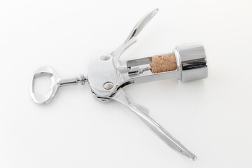 corkscrew with wine cork, on a white background