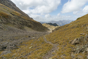 Beautiful pyrenees mountain landscape at Col de Lurien with hiking footpath on a beautiful autumn day, Artouste, Nouvelle-Aquitaine, France