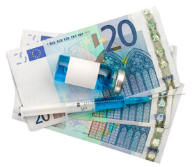 Covid-19 vaccine cost concept. Bottle vaccine on money