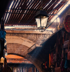 Moroccan souk market with spices lamps. Arab middle eastern market