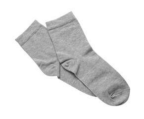 Pair of grey socks isolated on white, top view