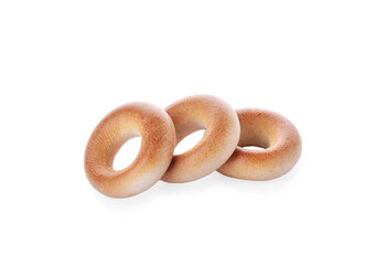 Tasty dry bagels (sushki) on white background