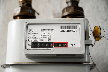Natural gas meter in building. Distribution of gas to households. 