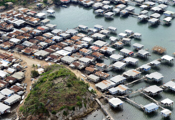 Port Moresby housing on the water, aerial image over the city in Papua New Guinea.
