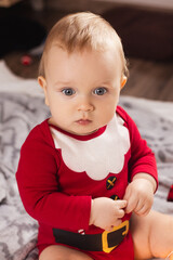 Beautiful little child is celebrating Christmas.