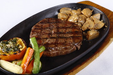 Closeup of tenderloin steak on a hot plate