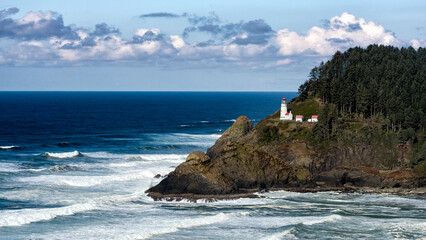 Fototapeta na wymiar Lighthouse over the ocean