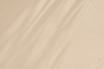 Beautiful abstract beige concrete cement wall background texture, natural shade, veranda pattern.