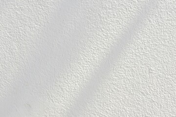 Natural sunlight shadow on beautiful abstract white concrete cement wall background texture