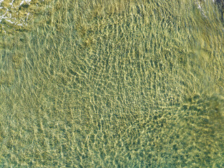 Aerial view Amazing open sea surface texture, Beautiful ocean in the morning summer season,Image by Aerial view drone shot,high angle view Top down sea waves water background