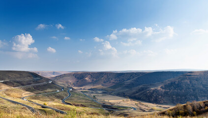 Aerial view of winding road on mountains