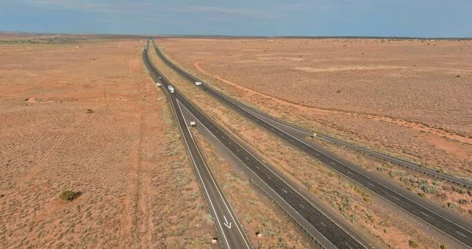 This is panoramic view of an American highway located west in desert environment near San Jon in New Mexico, USA.