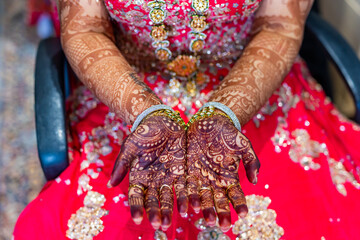 Indian Hindu bride's wedding henna mehendi mehndi hands close up