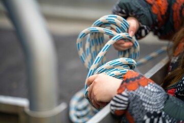 girl holding rope on a work site in american
