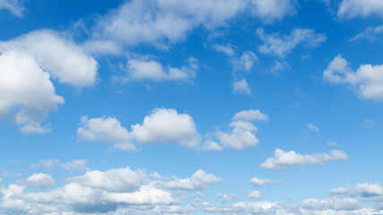 Fototapeta na wymiar Blue sky with some white clouds