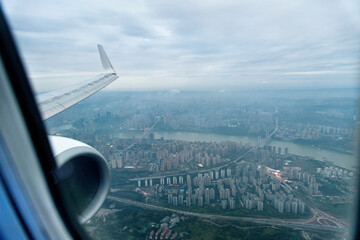 View of the city from the flying plane window