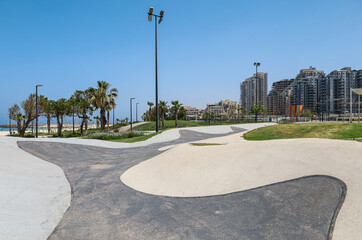 View of beautiful skate park and palm trees on sunny day