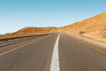 Fototapeta na wymiar View of highway road in desert