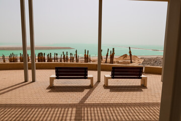 View of beautiful beach with benches