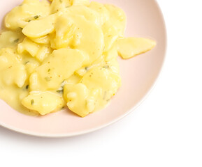 Plate with creamy potato salad on white background, closeup