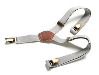 Grey suspenders on white background