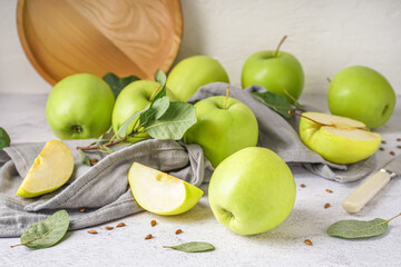Fresh green apples on light table