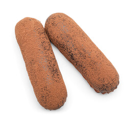 Delicious chocolate eclairs on white background