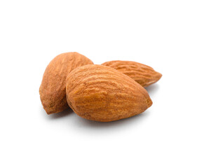 Few tasty almonds on white background