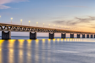 Part of the famous Oresund bridge between Denmark and Sweden after sunset