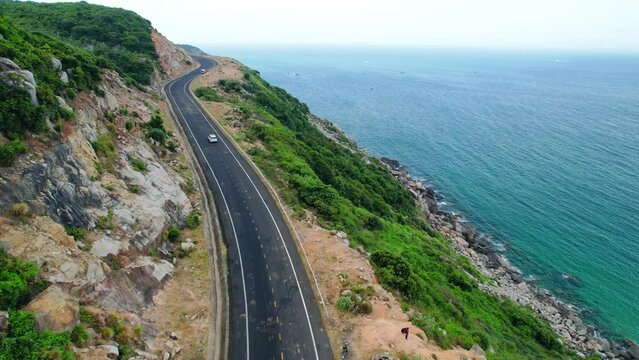 Landscape Vung Ro Bay in the morning with a spectacular pass road winding around the coastal mountainside. This place is considered the most beautiful bay in central Vietnam