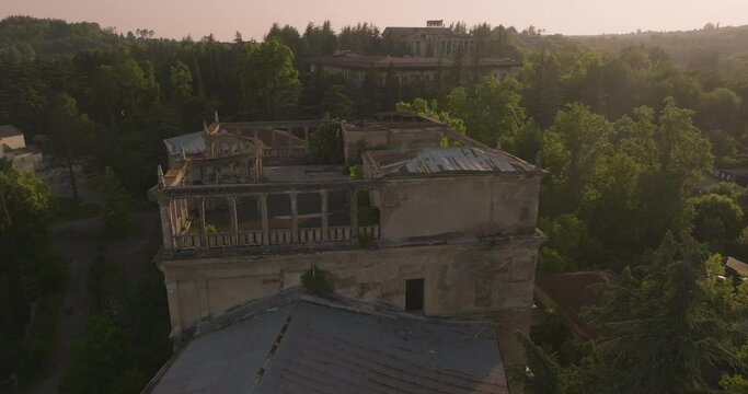 Dilapidated Structure Of The Abandoned Sanatorium Medea In Tsqaltubo, Georgia. Aerial Drone Shot