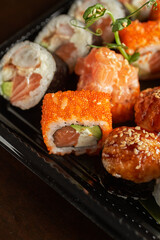 Set of different sushi and rolls wood desk top view nature food chopstick japan traditional fish tasty closeup