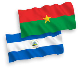 Flags of Nicaragua and Burkina Faso on a white background