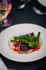 Light grilled fish with salad and asparagus