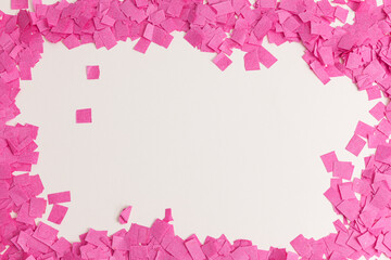 creative festive, lunar new year frame with pink confetti paper on white background, top view